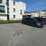 Neerklapbare parkeerbeugel met rode reflectie - Hangslot met voetplaat